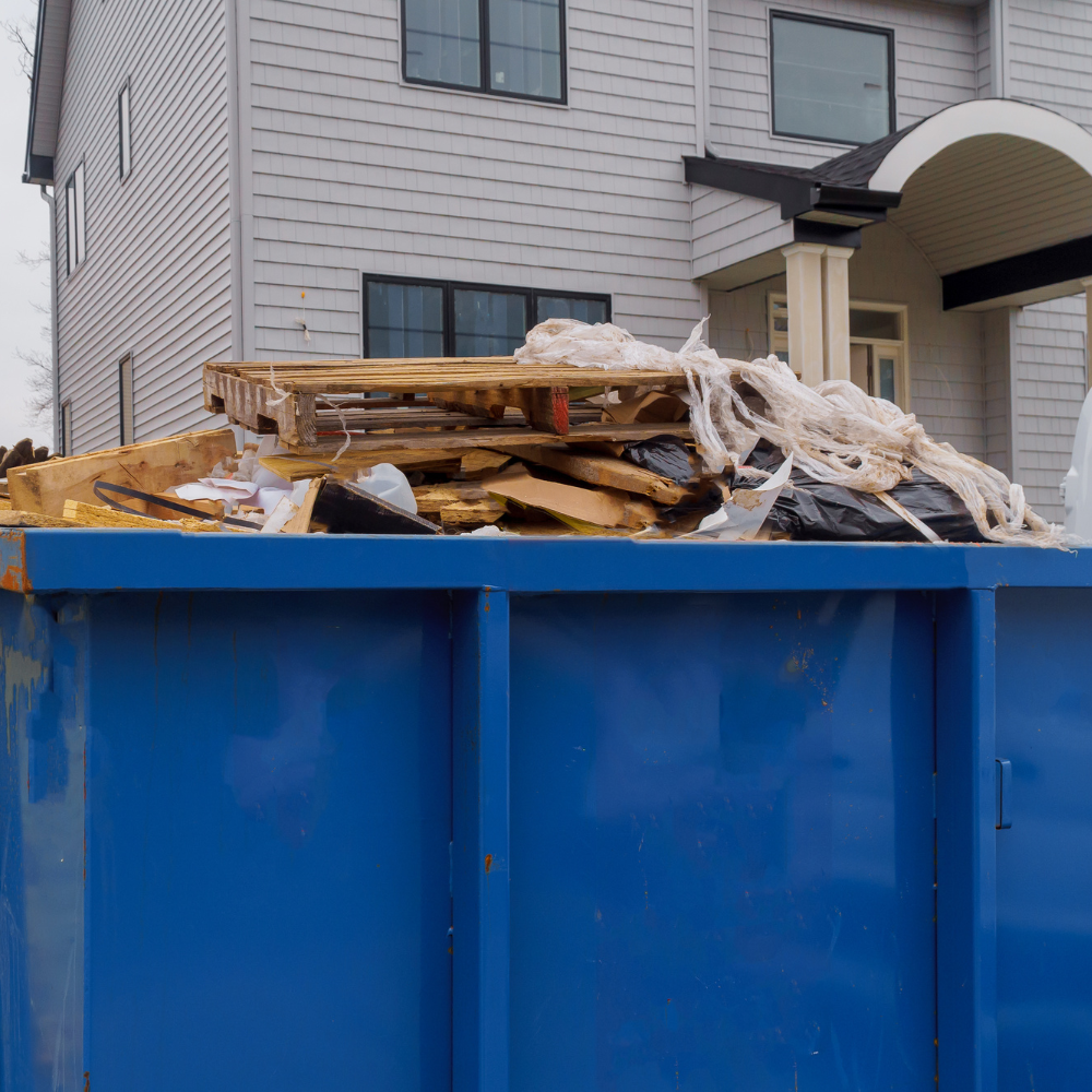 dumpster rental being supplied by c&c land services & cleaning